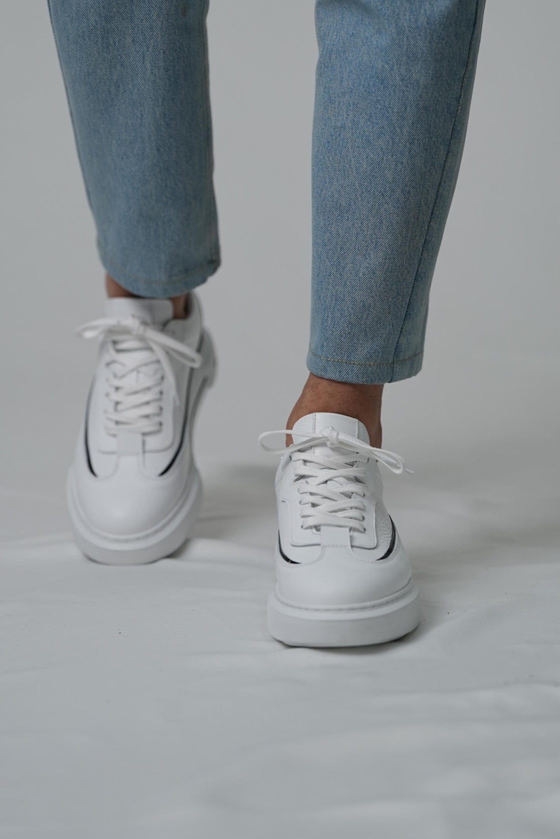 white leather sneakers